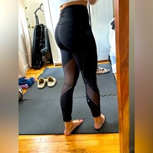 Black Lululemon leggings with Mesh cutouts